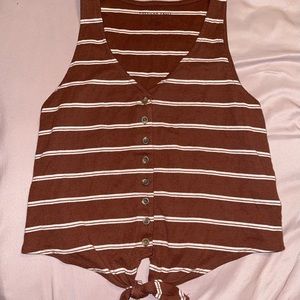 Tank top with knot on bottom